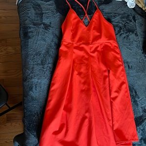 It’s a orange midi Dress, size S